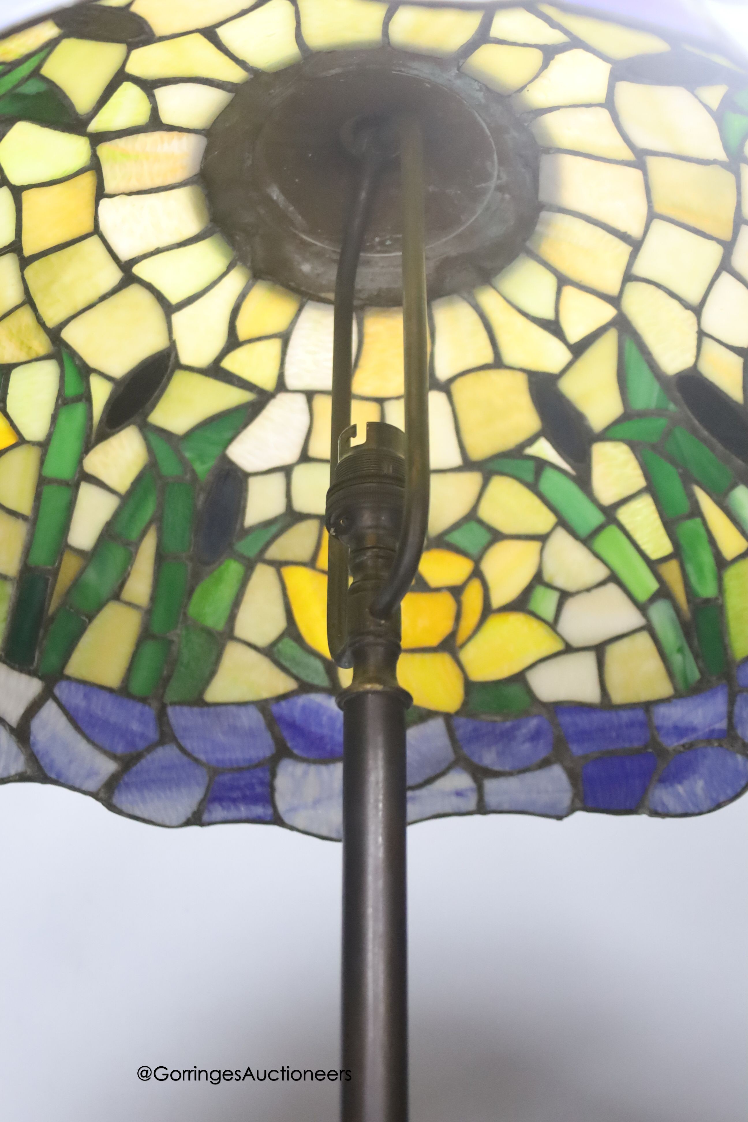 A Tiffany style lamp and shade, base marked RD427117, height 54cm